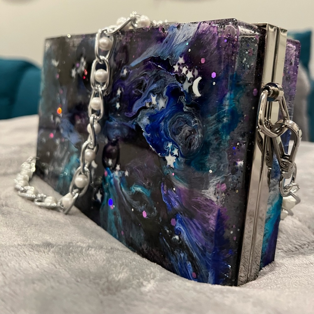 Glow in the dark galaxy purse